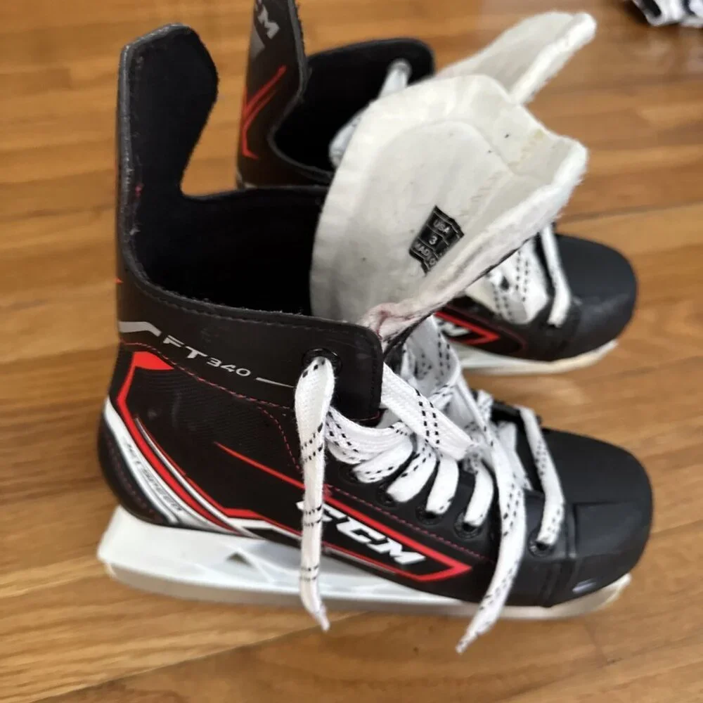 CCM Kids Black and White Ice Skates